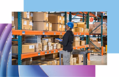 Workers inventorying and organizing items in a warehouse.