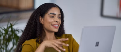 A person looking at a computer screen.