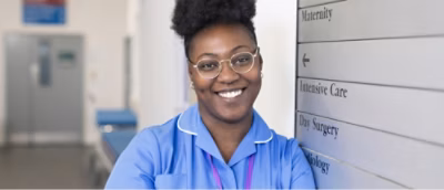 A person wearing glasses and a blue shirt