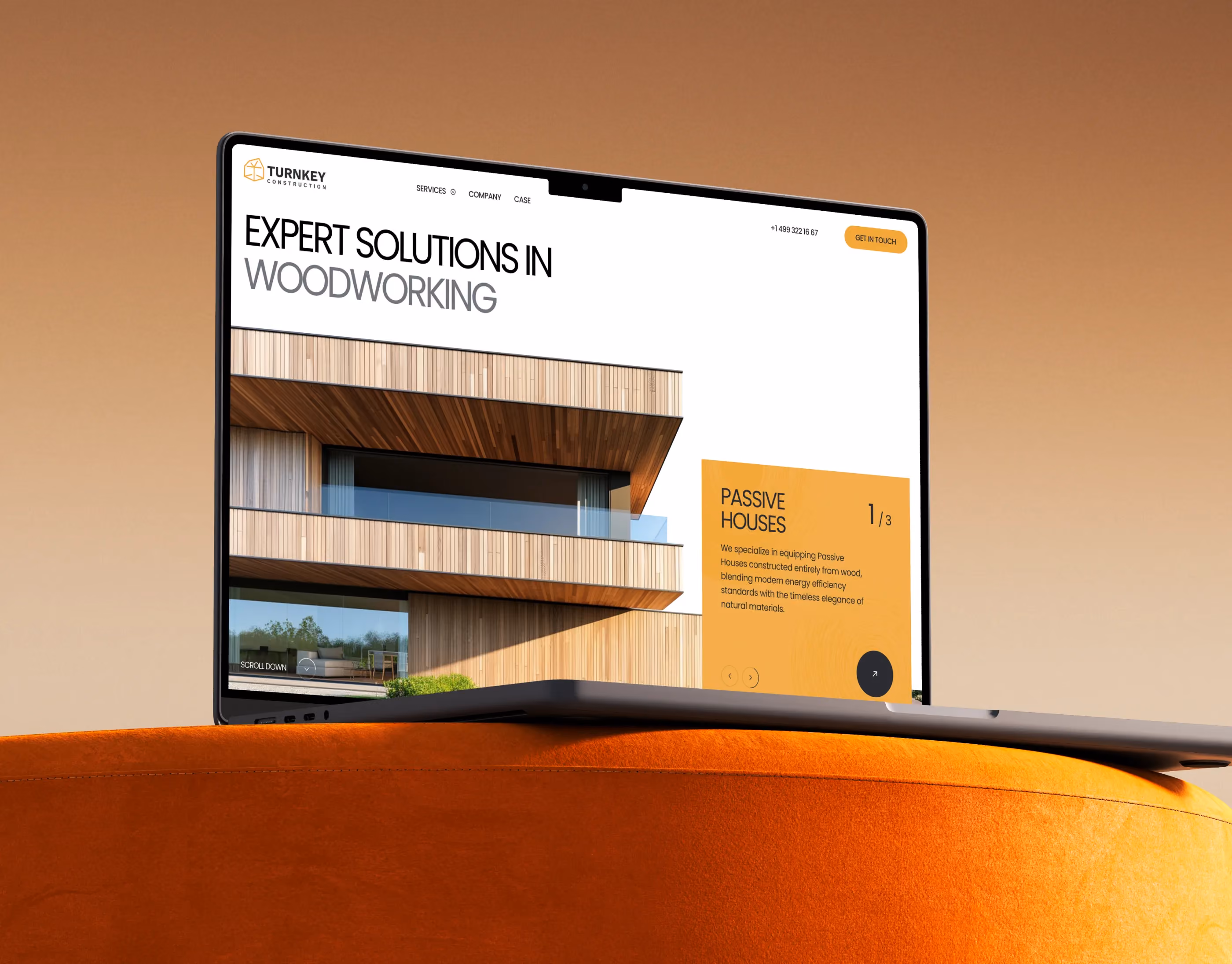 Modern website design for a woodworking company, showcasing passive house architecture on a sleek laptop screen.