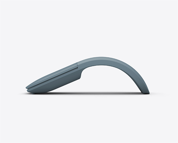 Curved blue ergonomic mouse shown in side profile on a light background.